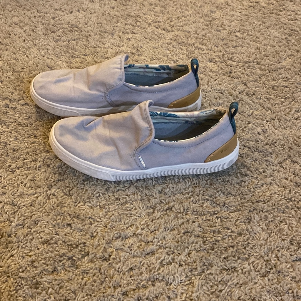 Tom’s Woman’s Size 9.5 Slip On Shoes. Gray In Color. Like New.